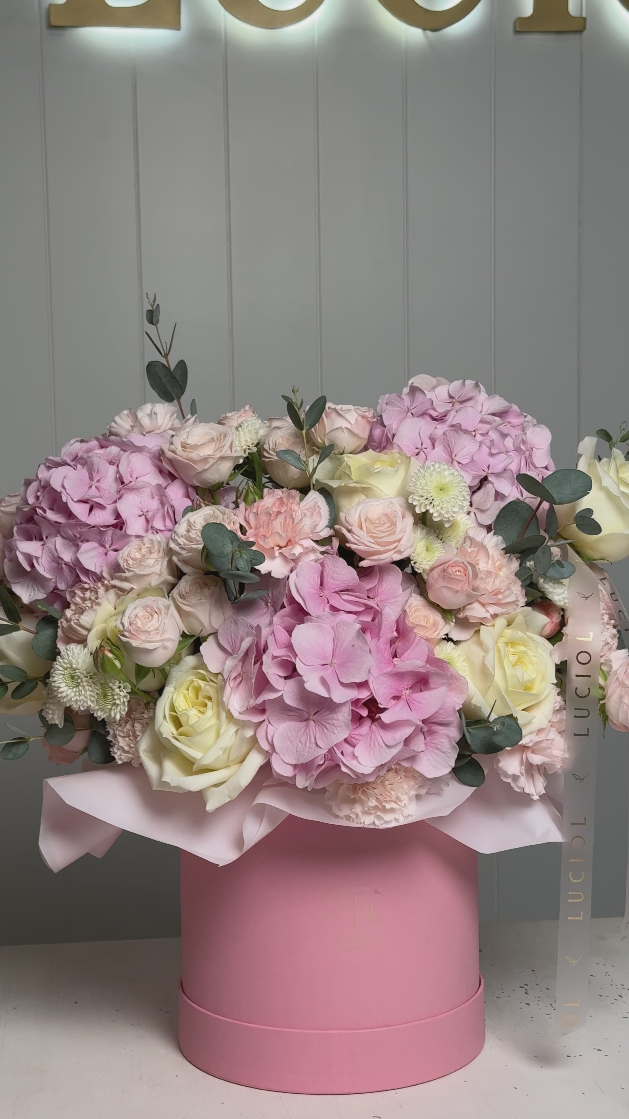 Load video: Box of Happiness pink pastel flower arrangement โ Luciol Bouquets Seattle Bellevue Kent delivery