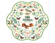 Milk chocolate set cocoa dusted truffles with almond & hazelnut pieces