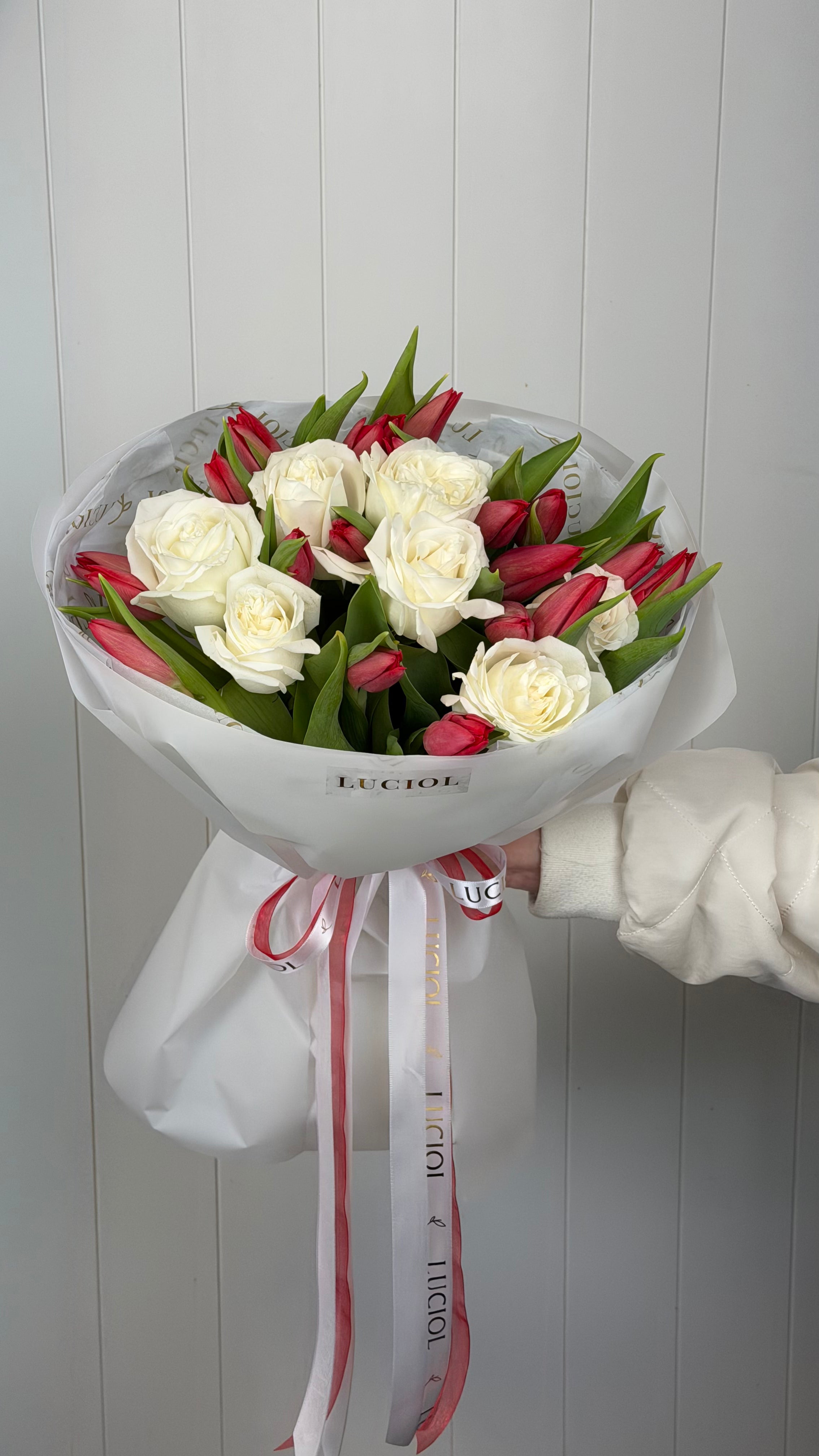White roses and red tulips bouquet by Luciol Bouquets – flower delivery Seattle and Bellevue